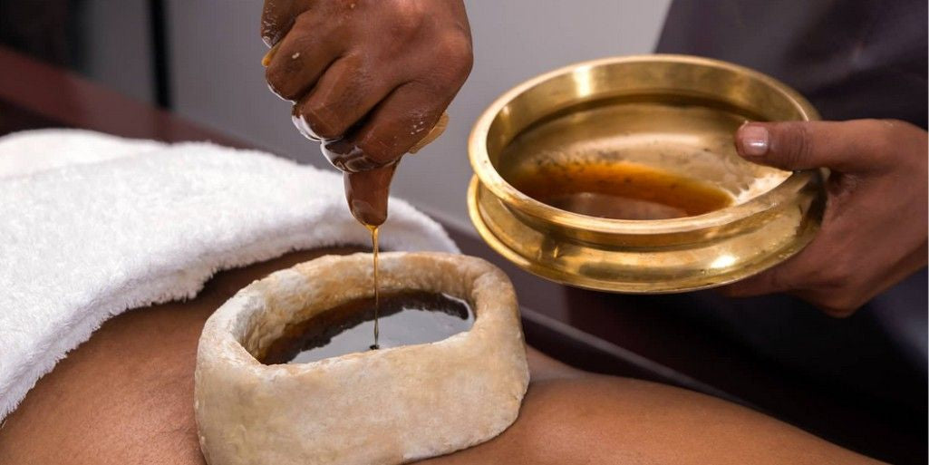 Ayurvedic pain management with herbal oils for joint and muscle pain relief